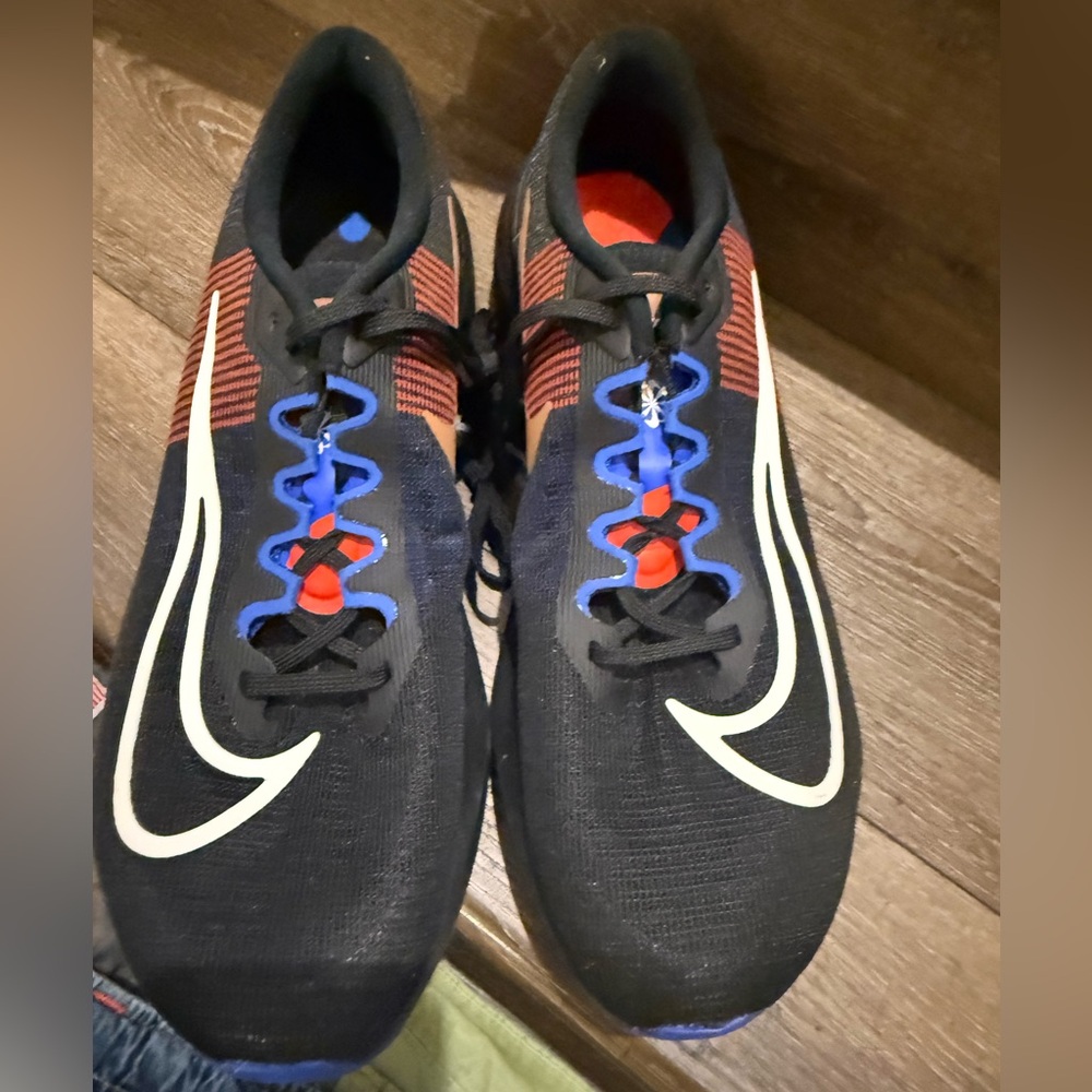 Nike Black and Red Sneakers with Blue Accents